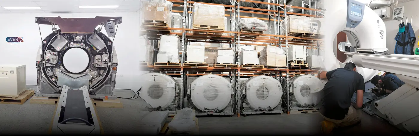 A CT gantry being worked on beside the racks of the EverX warehouse